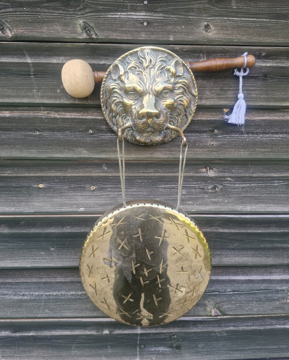 Wall mounted brass dinner gong.  View II