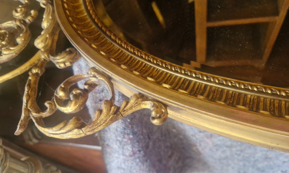 Edwardian gilded oval wall mirror.  View II