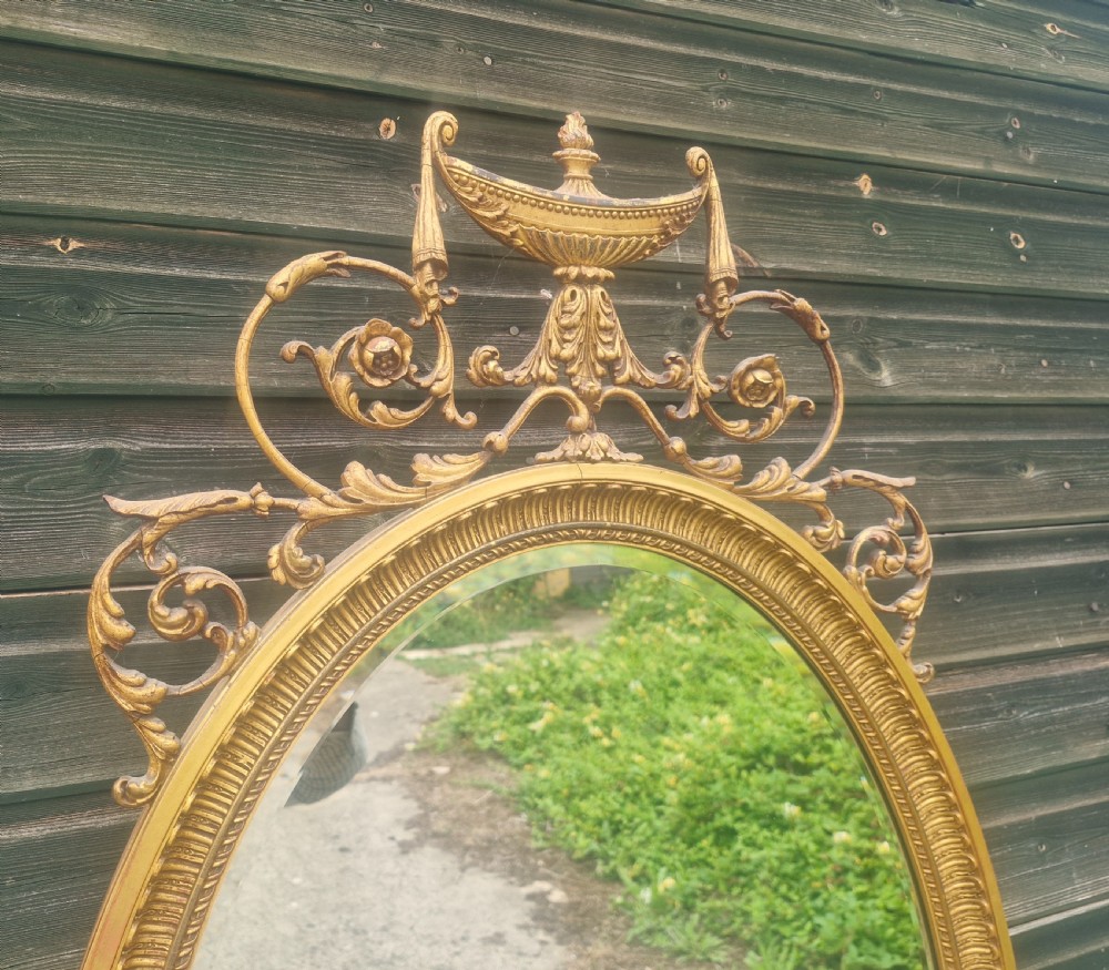 Edwardian gilded oval wall mirror.  View V