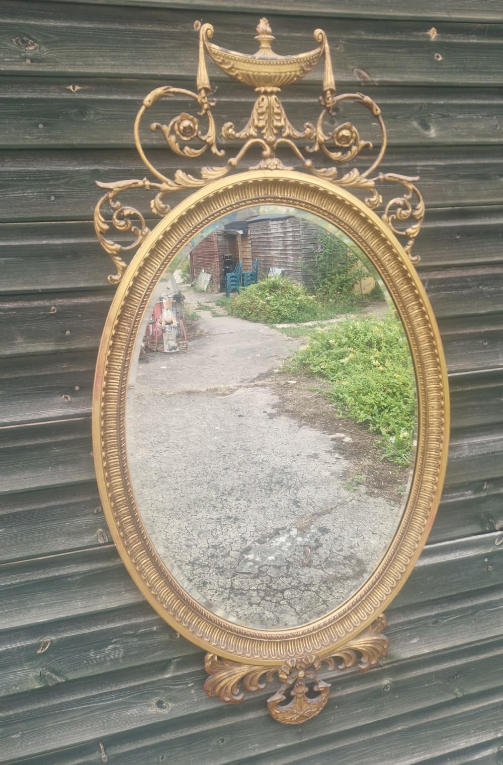 Edwardian gilded oval wall mirror.  View VII