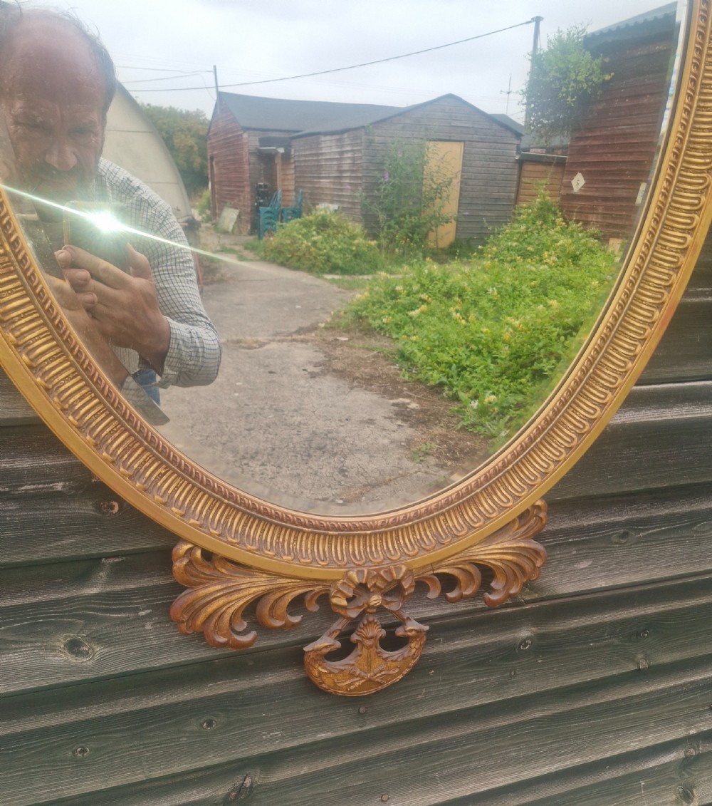 Edwardian gilded oval wall mirror.  View VIII