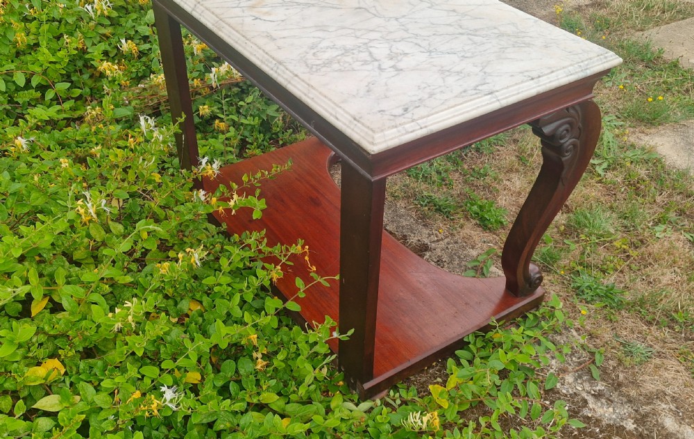 Regency mahogany marble top hall table with all round bevel edge. View III
