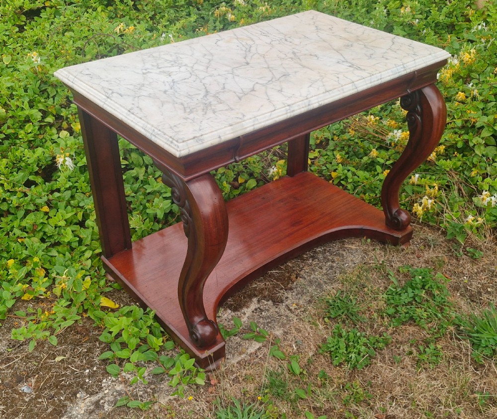 Regency mahogany marble top hall table with all round bevel edge. View VII