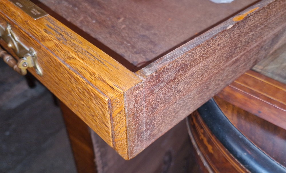 Edwardian oak pedestal partners desk. Stamped locks. View IV
