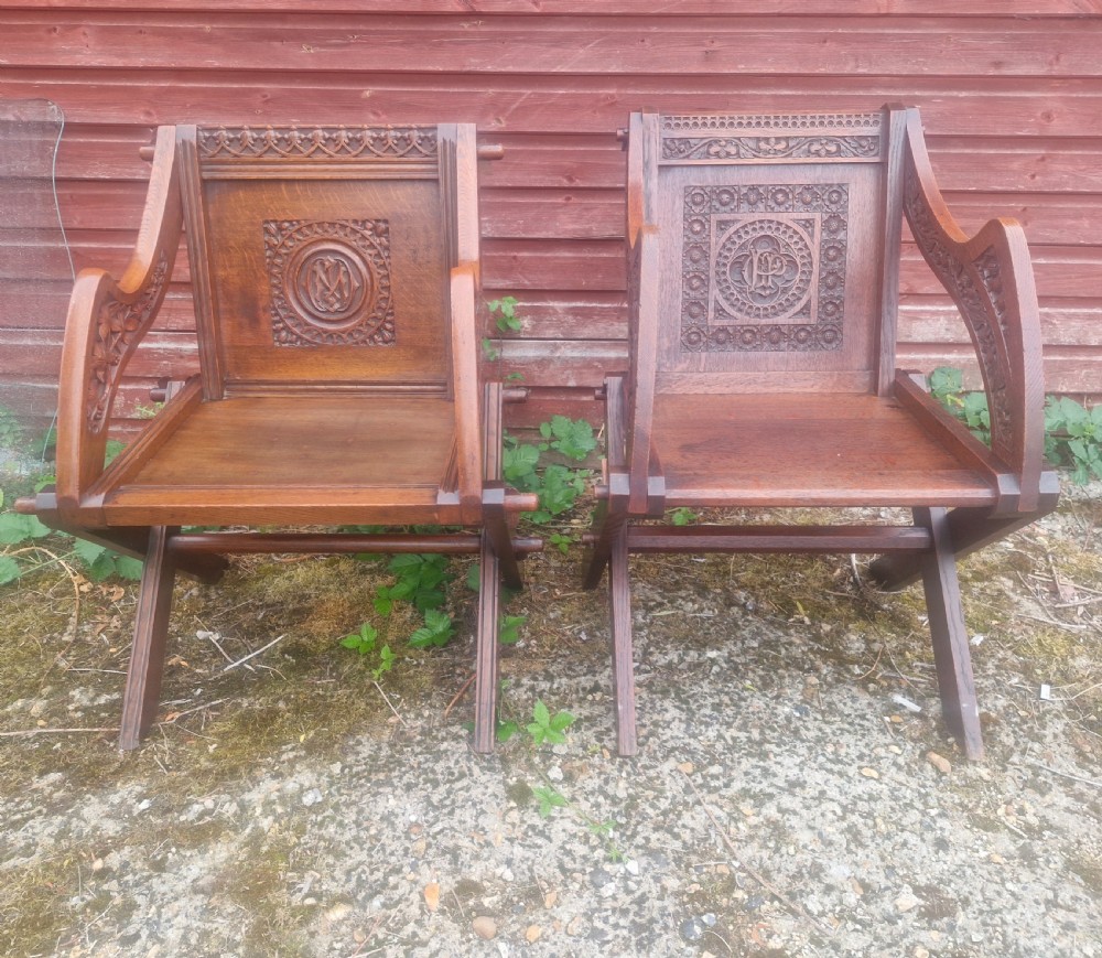 Matched pair of oak Glastonbury armchairs. 