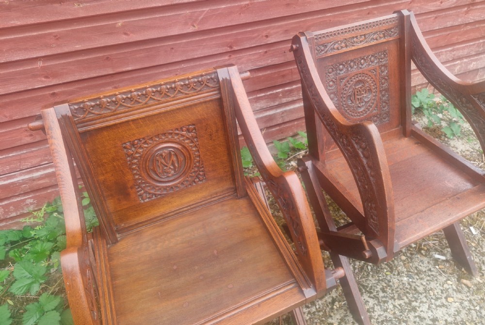 Matched pair of oak Glastonbury armchairs.  View II