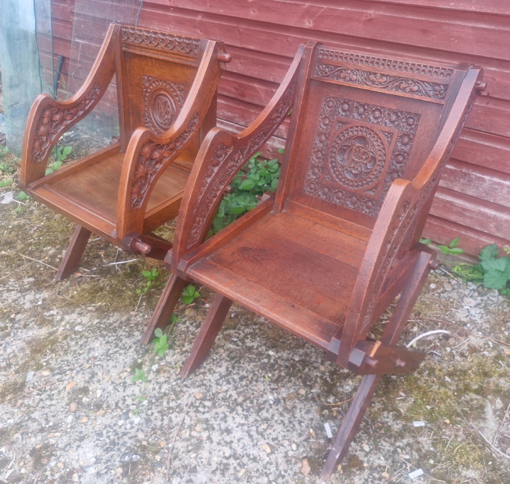 Matched pair of oak Glastonbury armchairs.  View V
