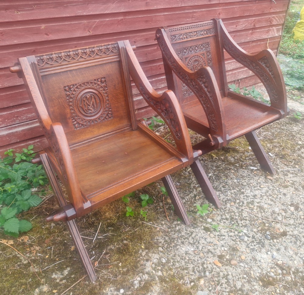 Matched pair of oak Glastonbury armchairs.  View VI