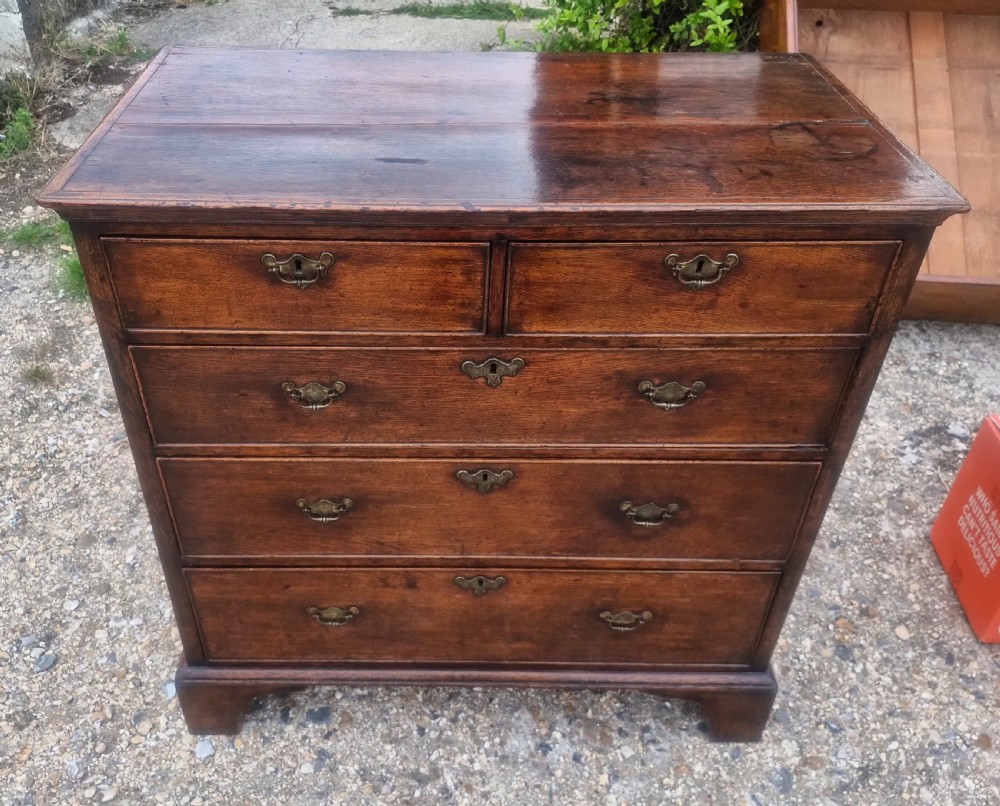 Mid 18th century oak chest of drawers.  View IV