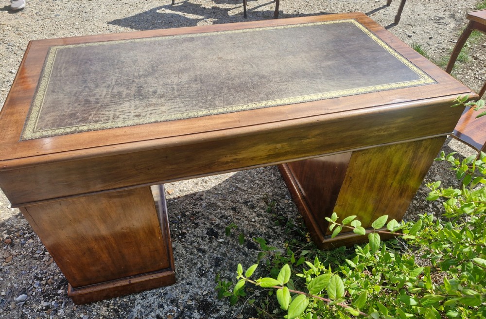 Mid 19th century mahogany kneehole pedestal desk.  View II