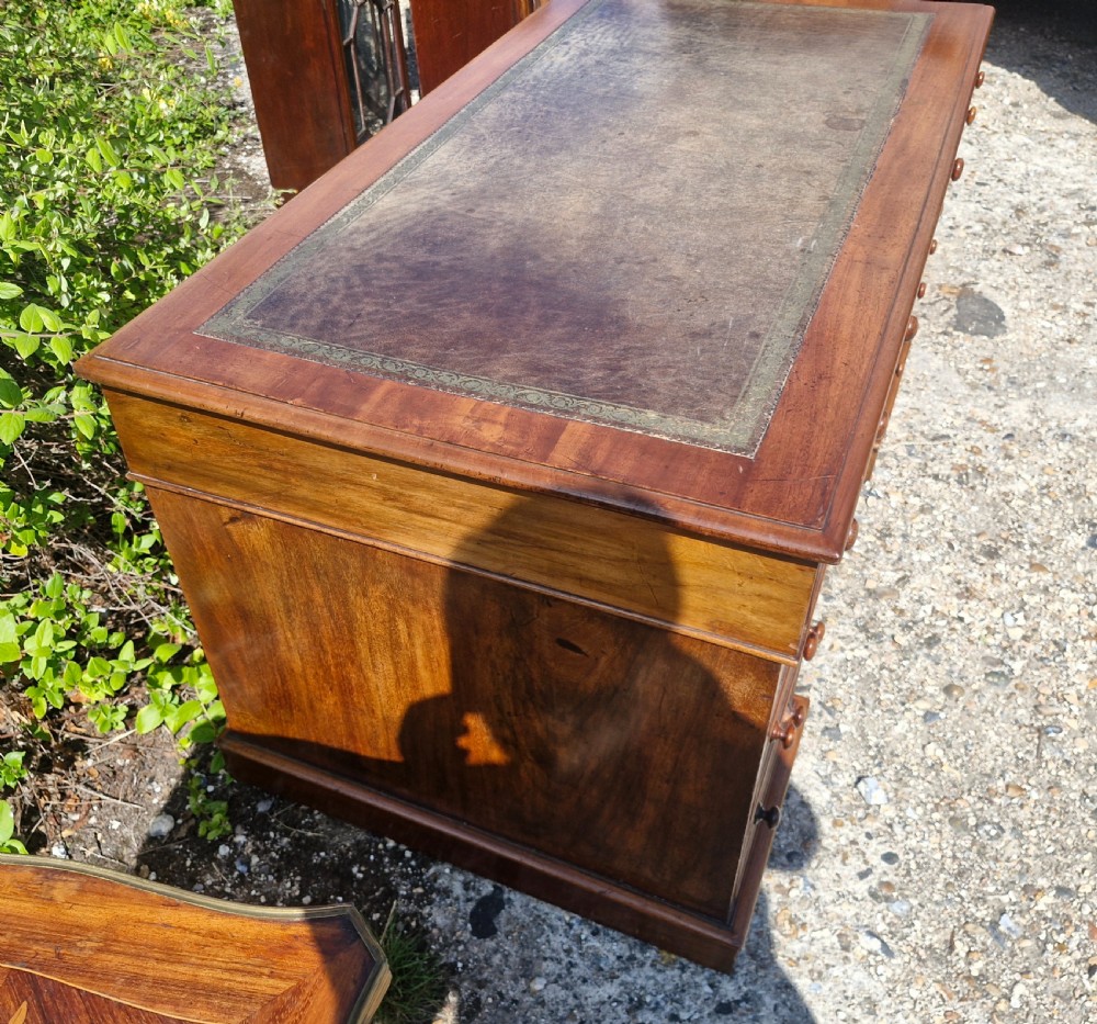 Mid 19th century mahogany kneehole pedestal desk.  View III