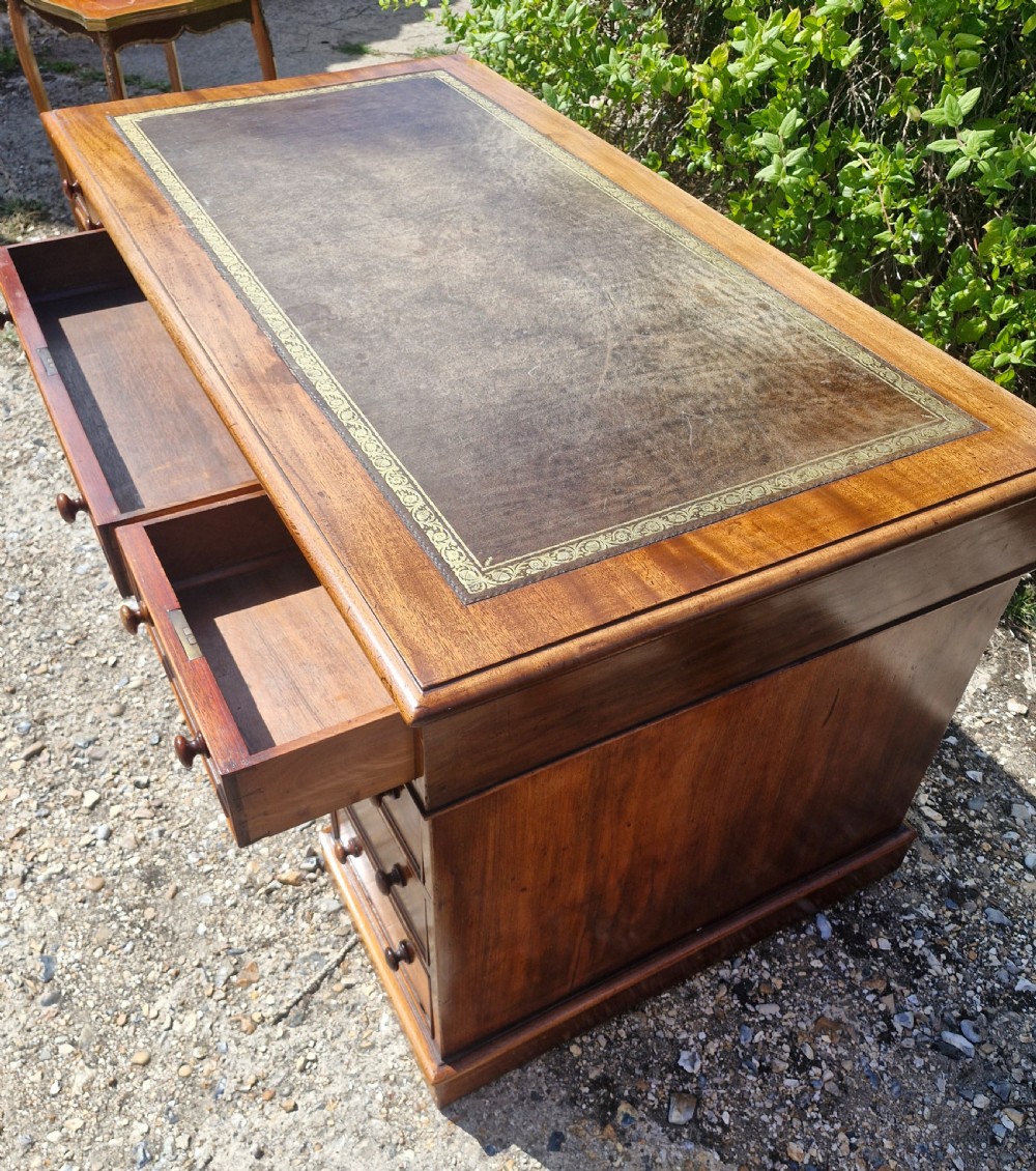 Mid 19th century mahogany kneehole pedestal desk.  View IV