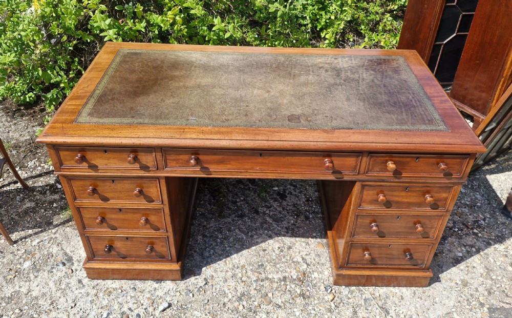 Mid 19th century mahogany kneehole pedestal desk.  View V