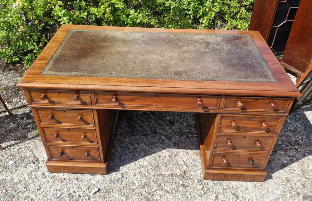 Mid 19th century mahogany kneehole pedestal desk.  View VI
