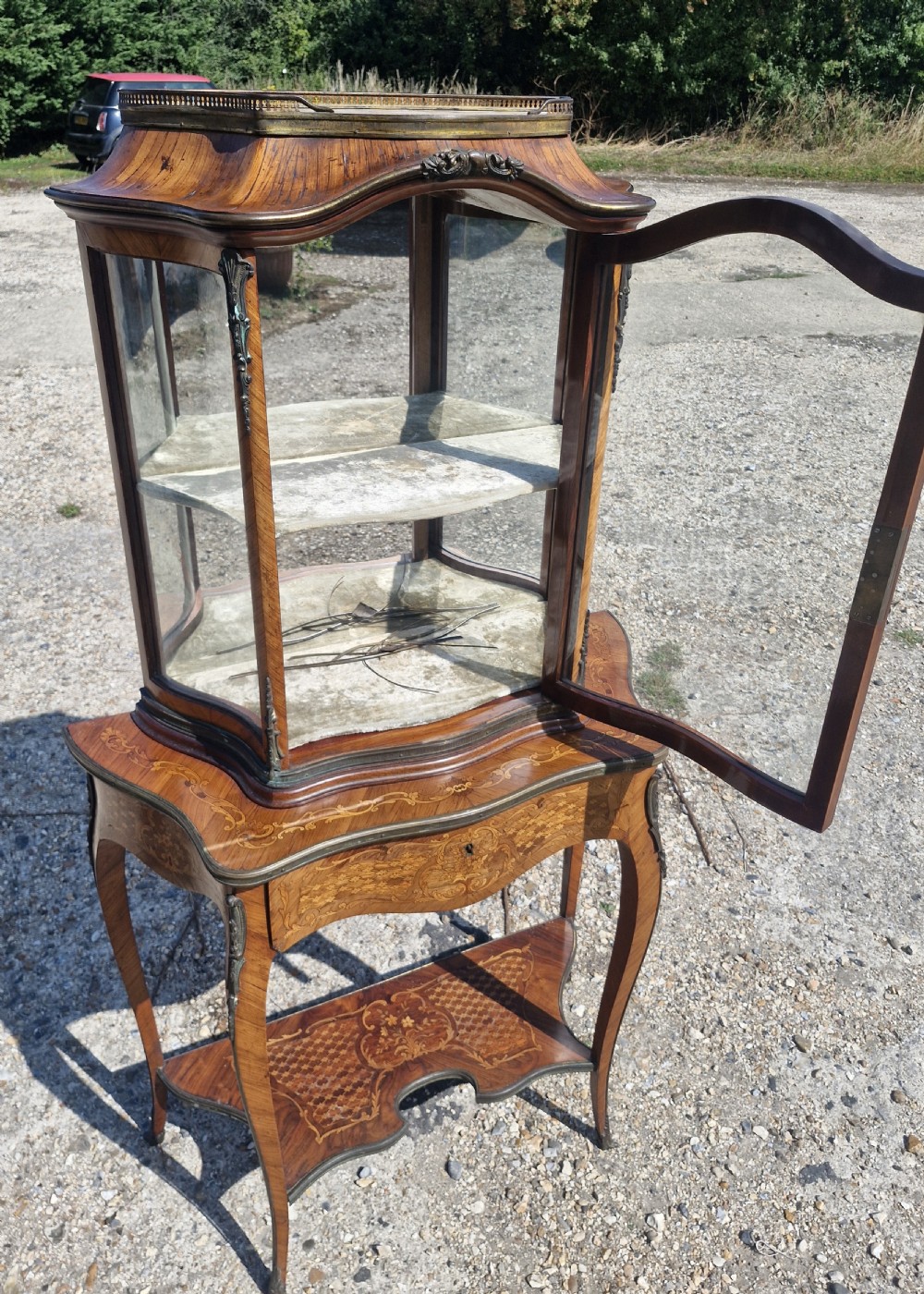 Good quality parquetry and inlaid display cabinet with writing drawer.  View II