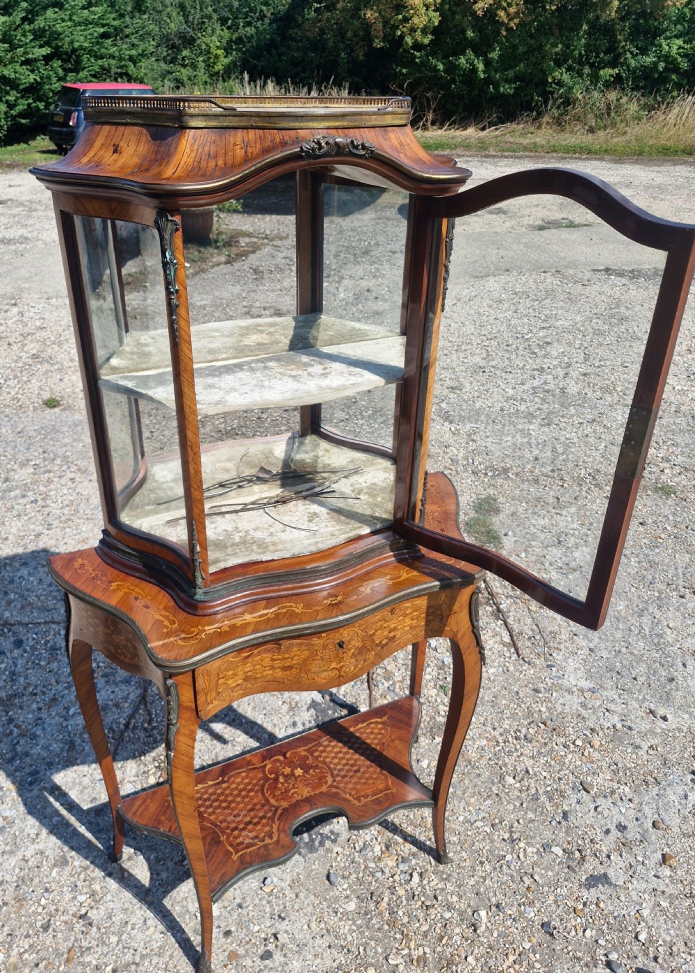Good quality parquetry and inlaid display cabinet with writing drawer.  View III