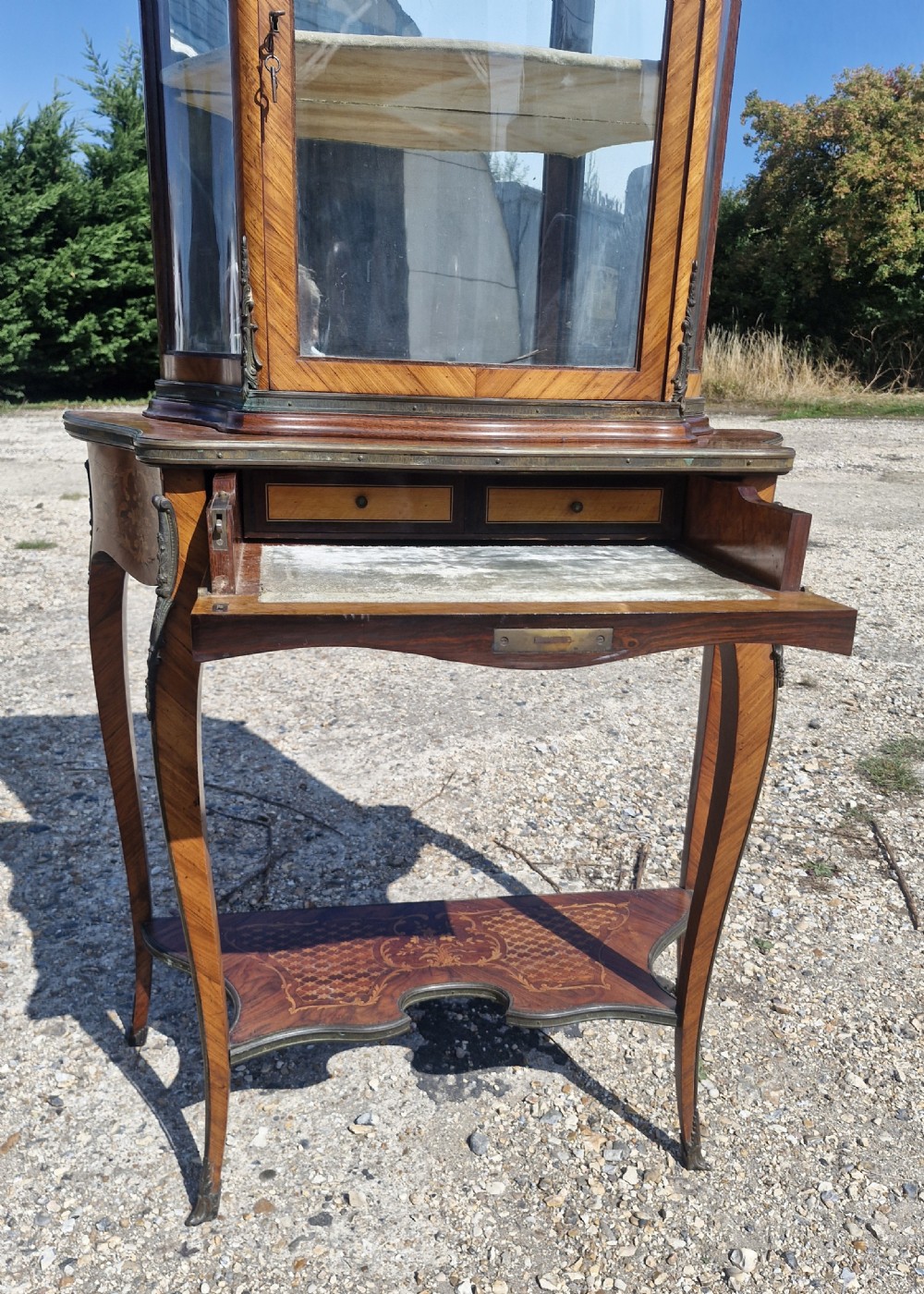 Good quality parquetry and inlaid display cabinet with writing drawer.  View VI