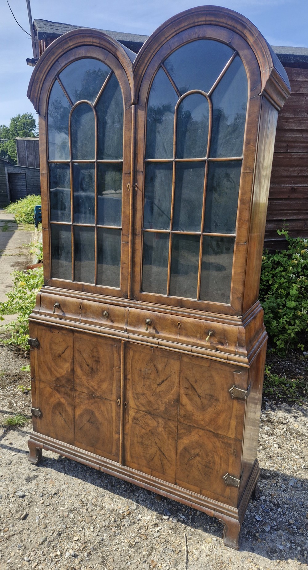 Good Queen Anne style walnut double domed cabinet. 