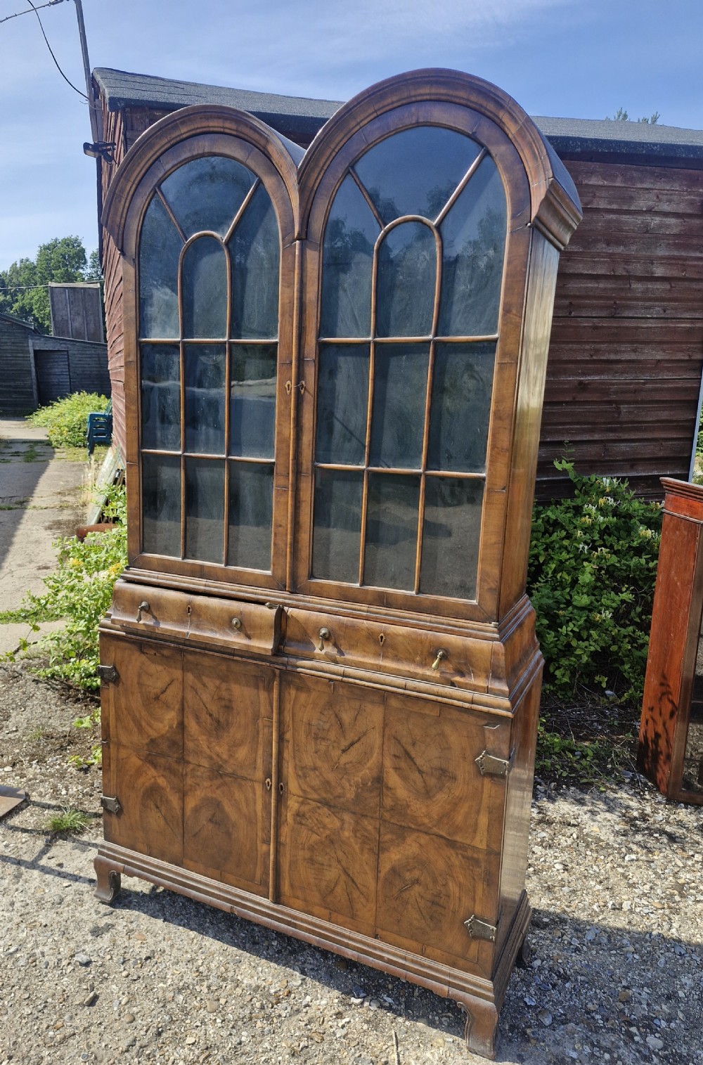 Good Queen Anne style walnut double domed cabinet.  View XI
