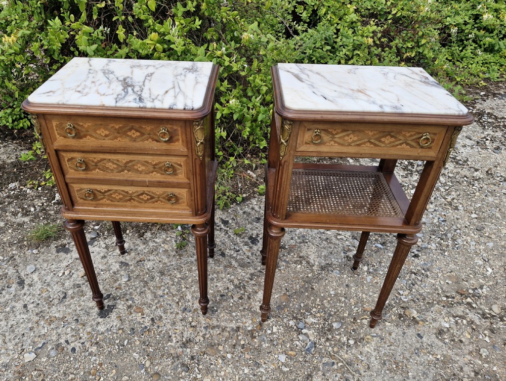 Pair of early 20th century inlaid mahogany marble top bedside cabinets. 
