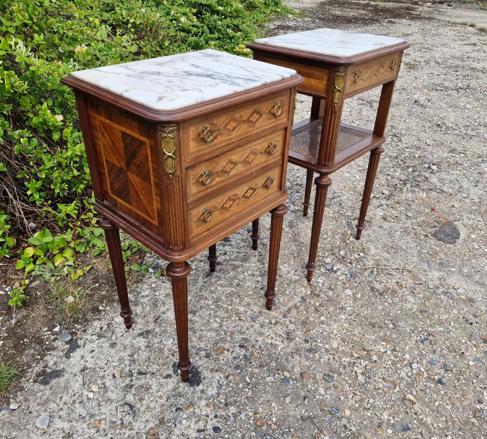 Pair of early 20th century inlaid mahogany marble top bedside cabinets.  View II