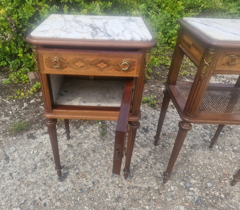 Pair of early 20th century inlaid mahogany marble top bedside cabinets.  View V