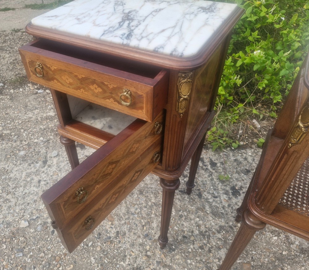 Pair of early 20th century inlaid mahogany marble top bedside cabinets.  View VII