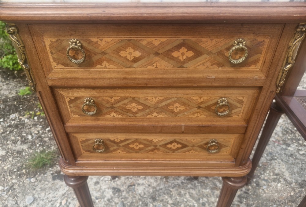 Pair of early 20th century inlaid mahogany marble top bedside cabinets.  View IX