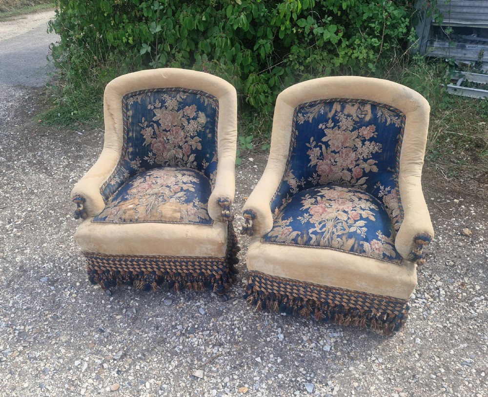 Pair of French mahogany frame upholstered armchairs. 