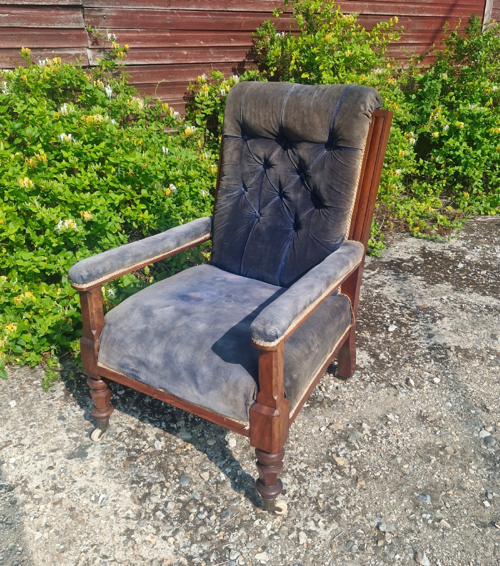 Good sized mid Victorian mahogany framed library armchair.  View IX