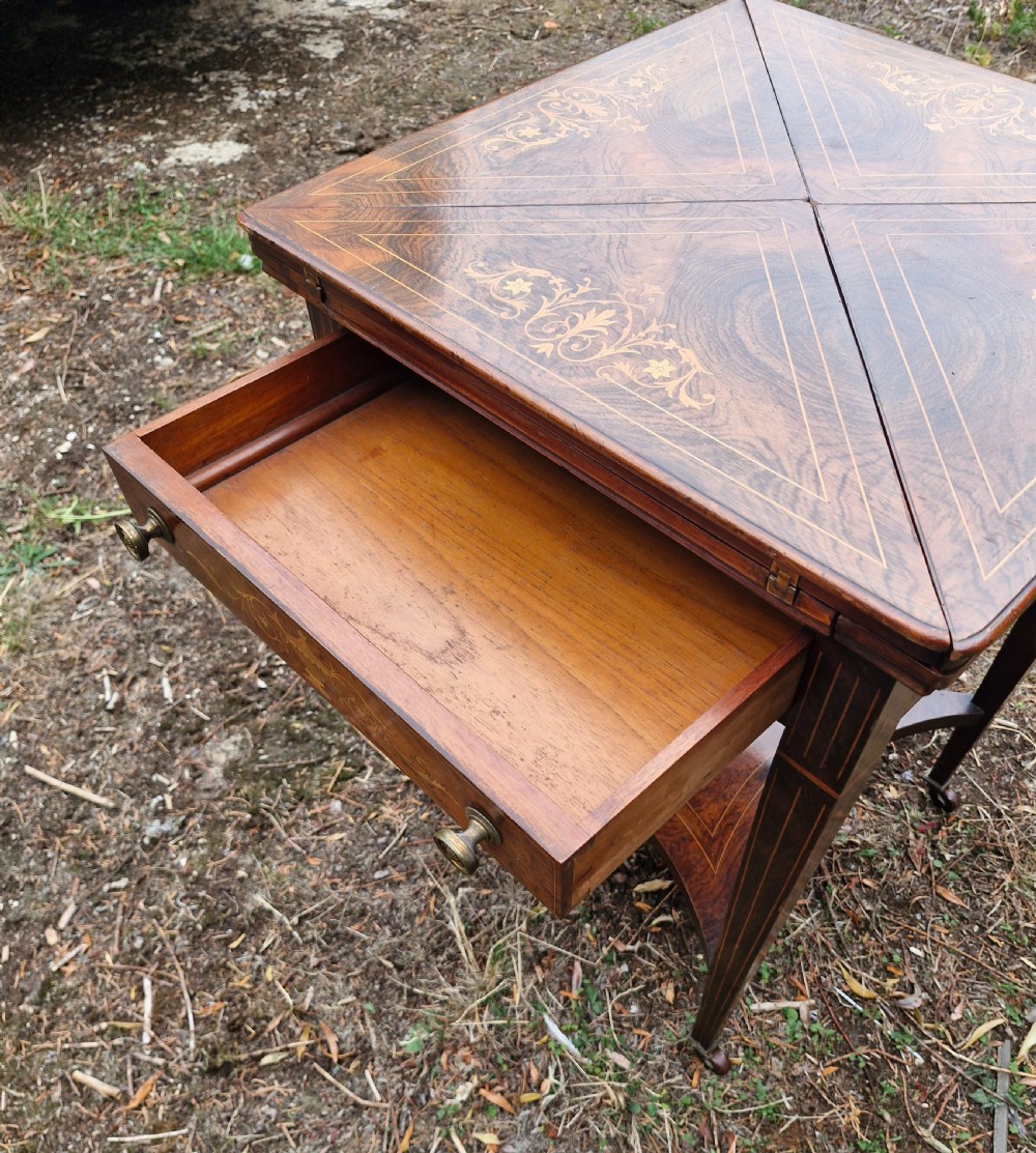 Edwardian inlaid rosewood envelope games table.  View II