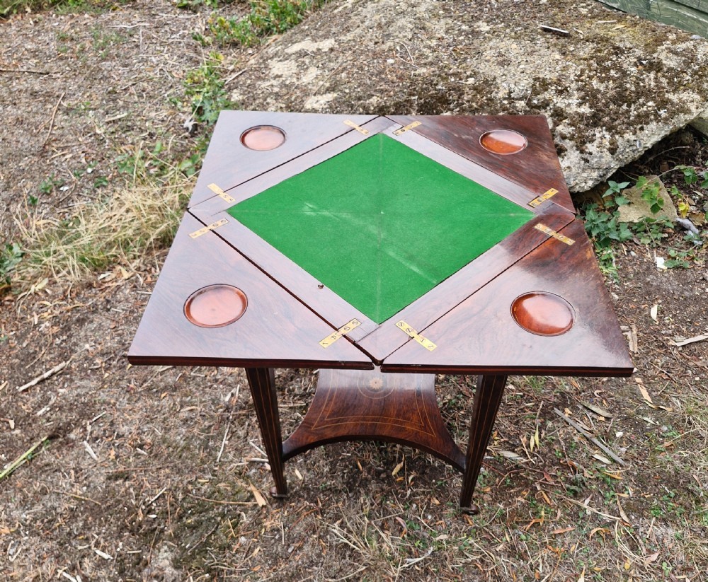 Edwardian inlaid rosewood envelope games table.  View VI