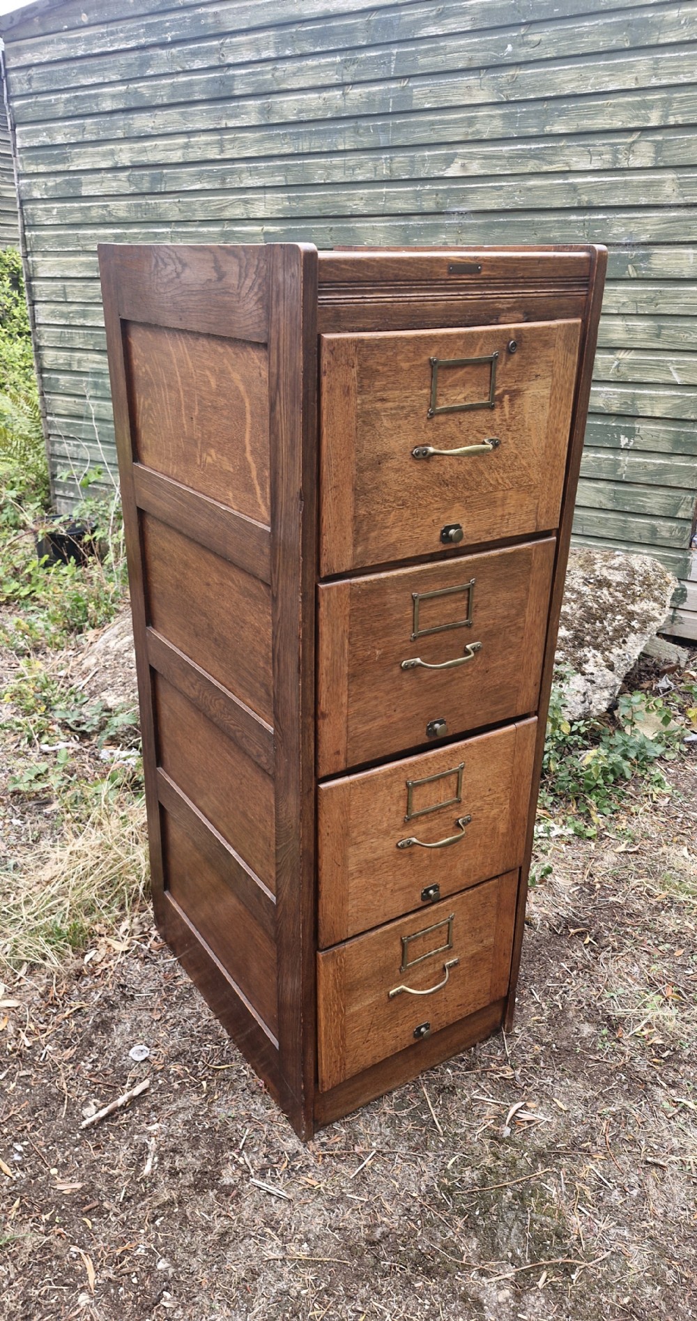 Panelled oak 4 drawer filing cabinet. 