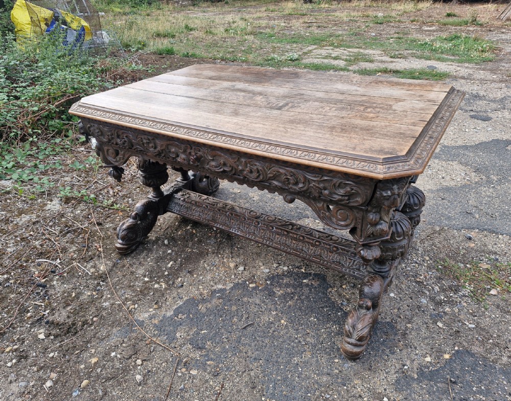 Large Victorian carved oak centre library table. 