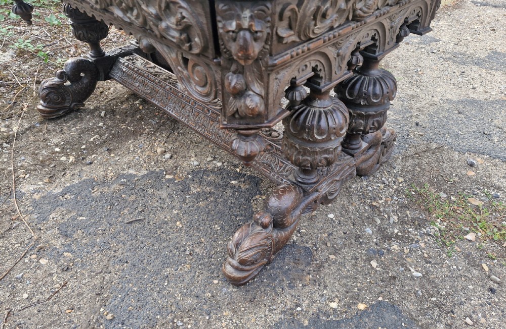 Large Victorian carved oak centre library table.  View II
