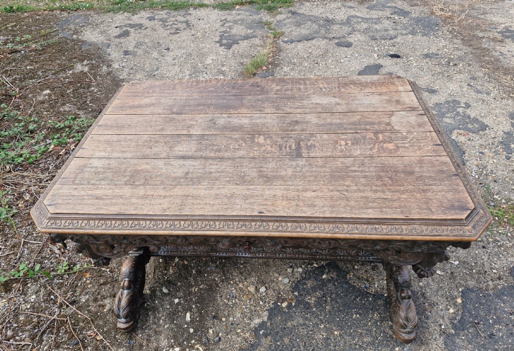 Large Victorian carved oak centre library table.  View III
