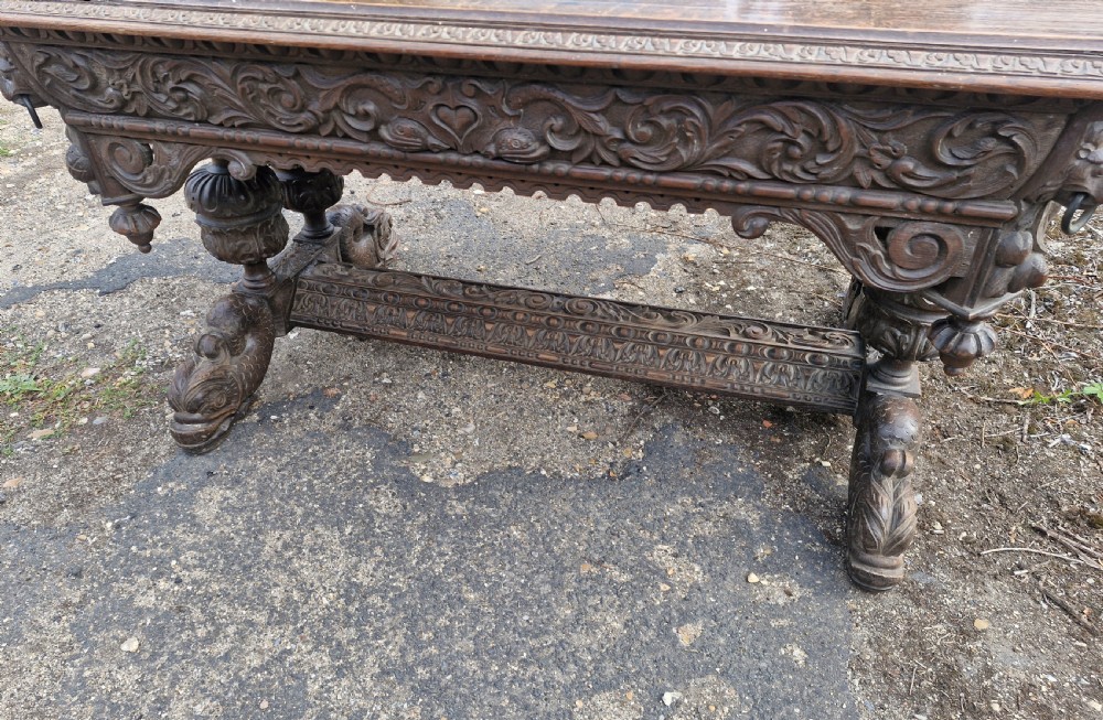 Large Victorian carved oak centre library table.  View V