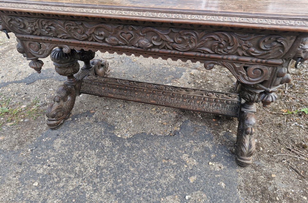 Large Victorian carved oak centre library table.  View VI