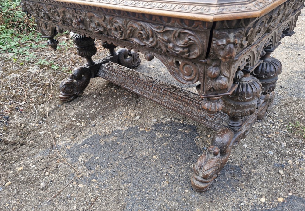 Large Victorian carved oak centre library table.  View VII