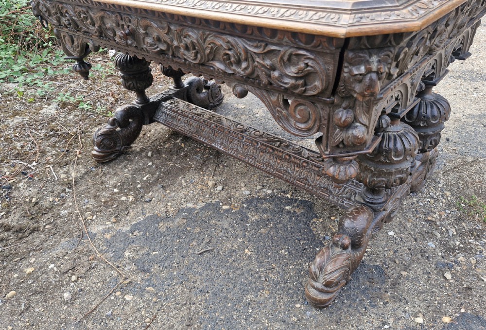 Large Victorian carved oak centre library table.  View VIII
