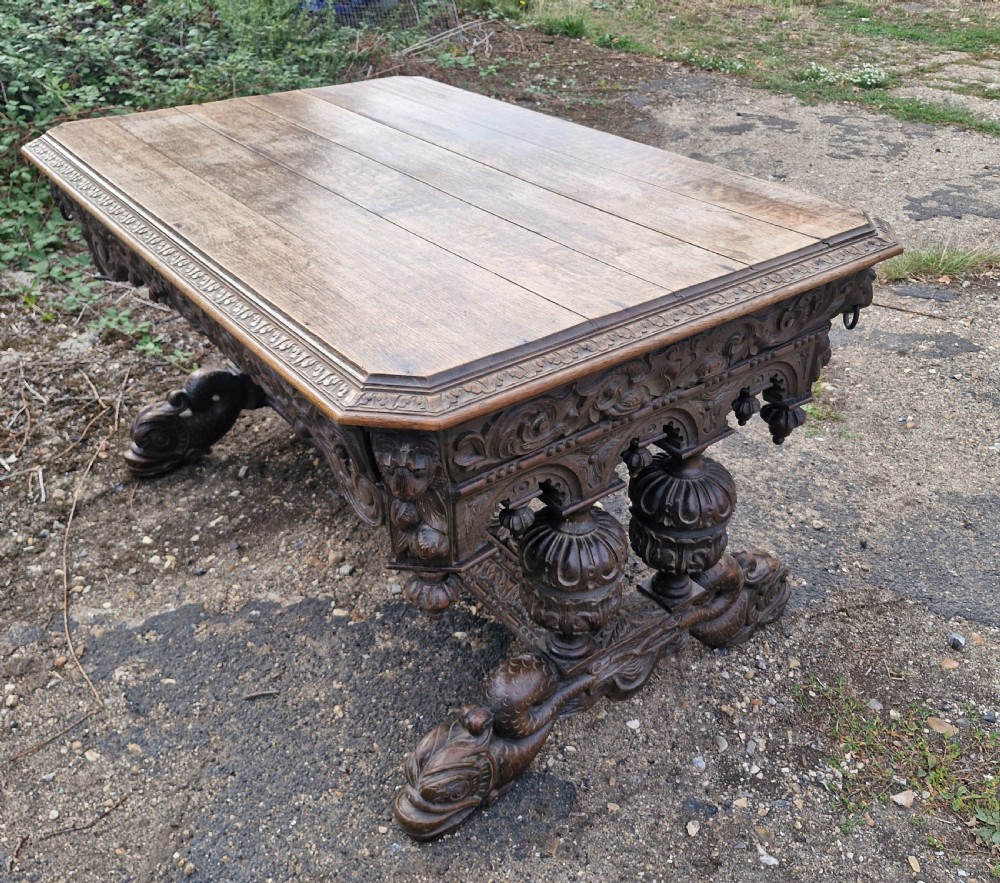 Large Victorian carved oak centre library table.  View X