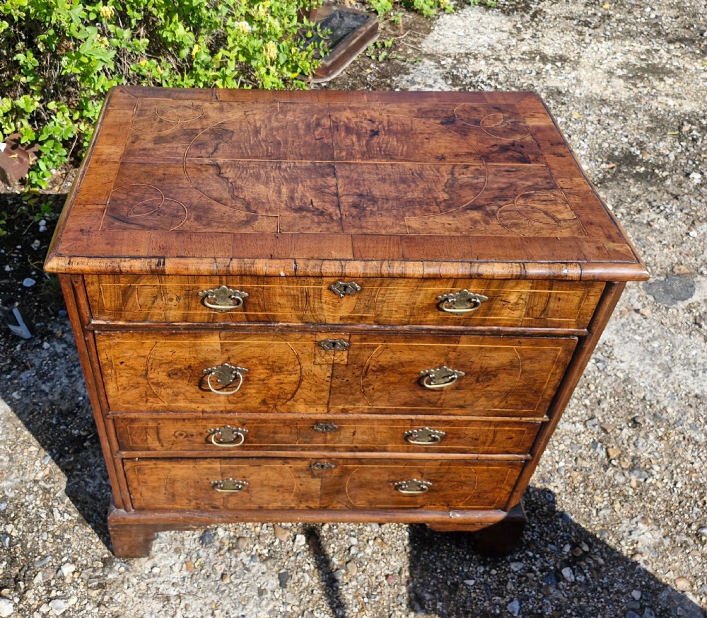 Early 18th century walnut chest of drawers.  View IV