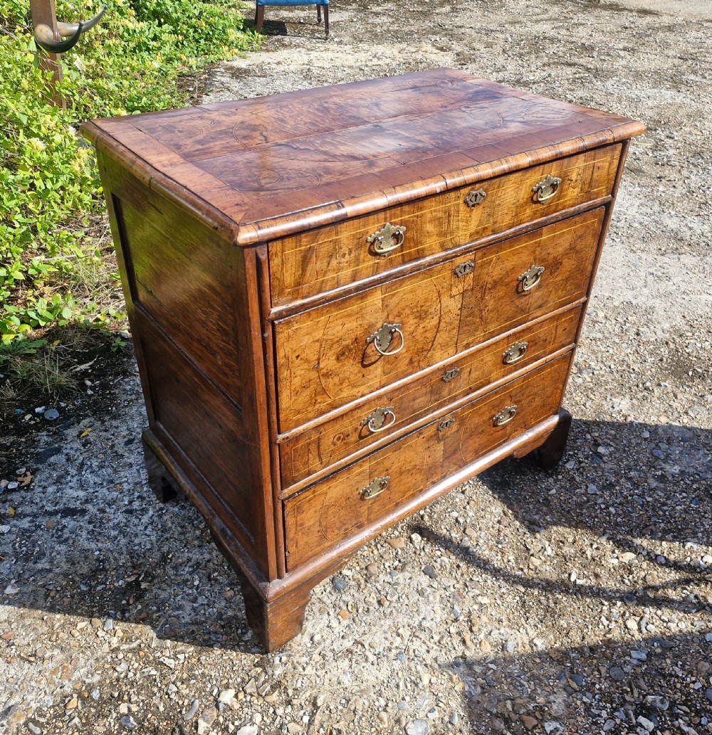 Early 18th century walnut chest of drawers.  View VI