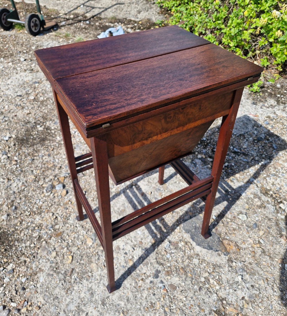 Edwardian walnut and mahogany sewing table.  View II