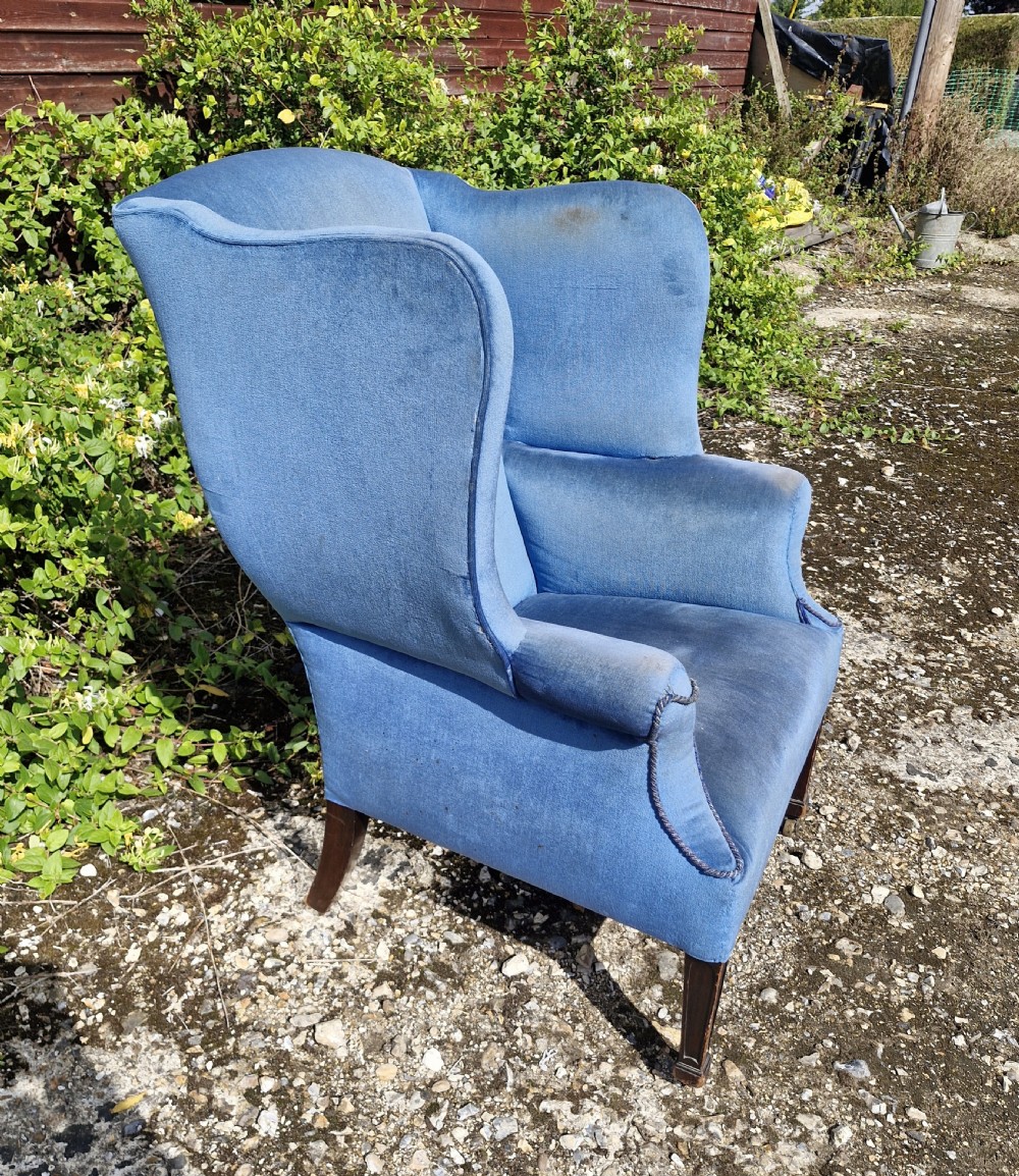 Good sized upholstered wing back armchair.  View II