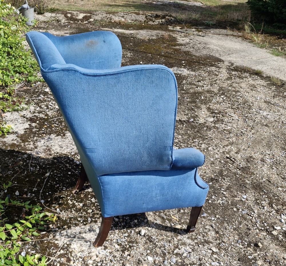 Good sized upholstered wing back armchair.  View III