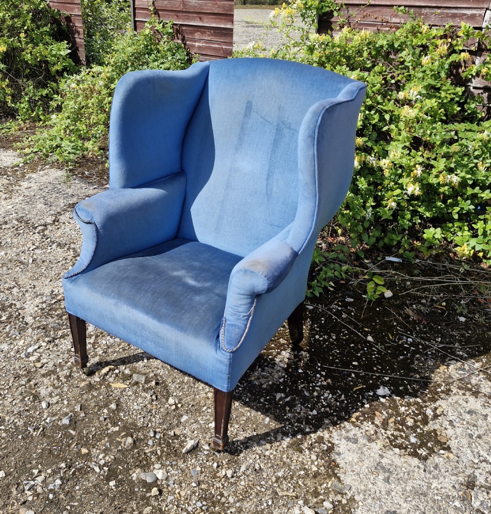 Good sized upholstered wing back armchair.  View IV
