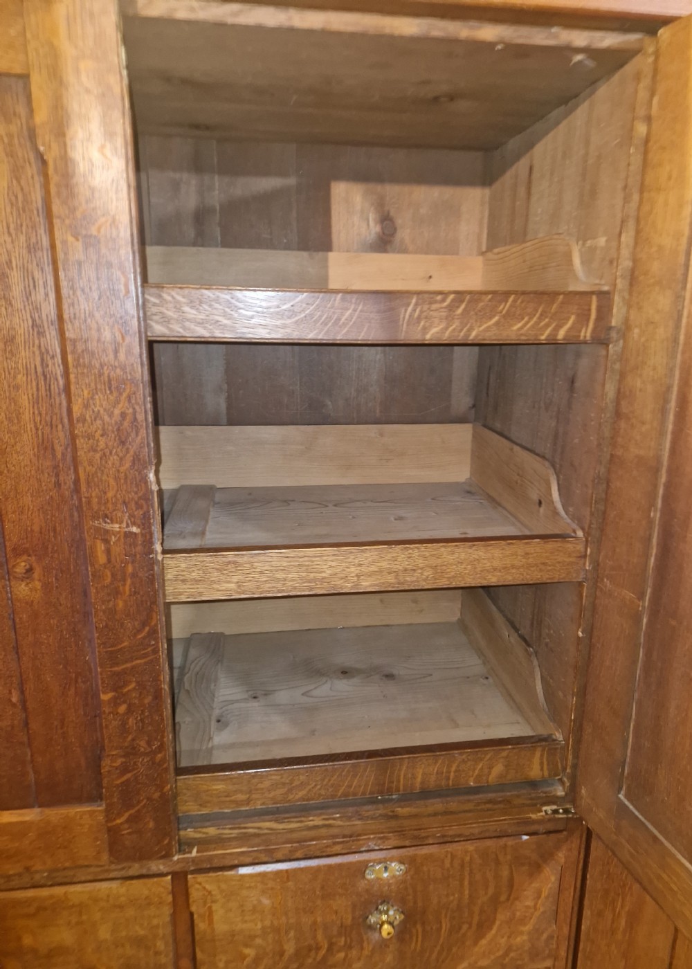 Oak arts and crafts wardrobe.  View XIII