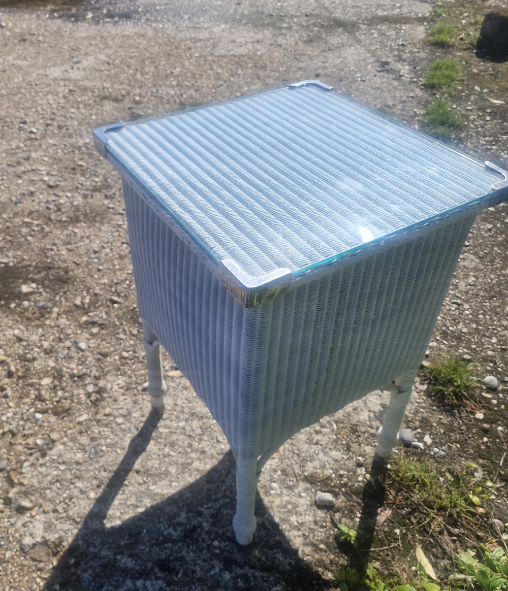 Large Lloyd Loom bathroom cabinet with plate glass top. View V