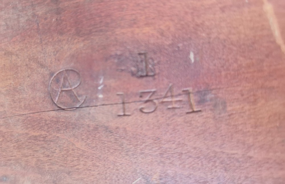 Edwardian inlaid mahogany revolving bookcase with makers stamp. View III